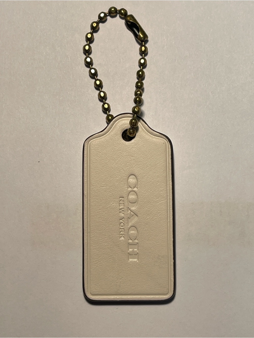 COACH Cream Leather Hang Tag with Brass Ball Chain